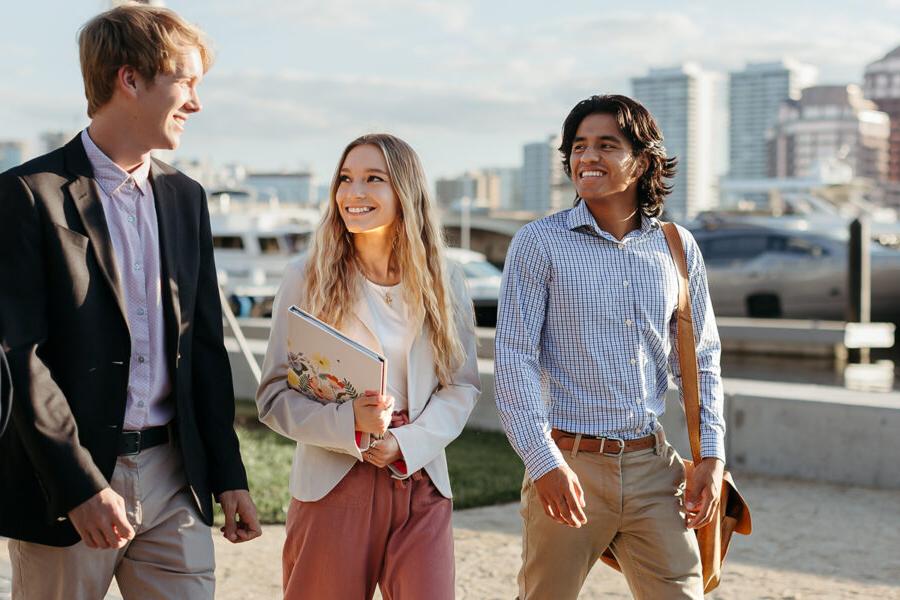 Three PBA students walk near the intercoastal waterway in West Palm Beach.